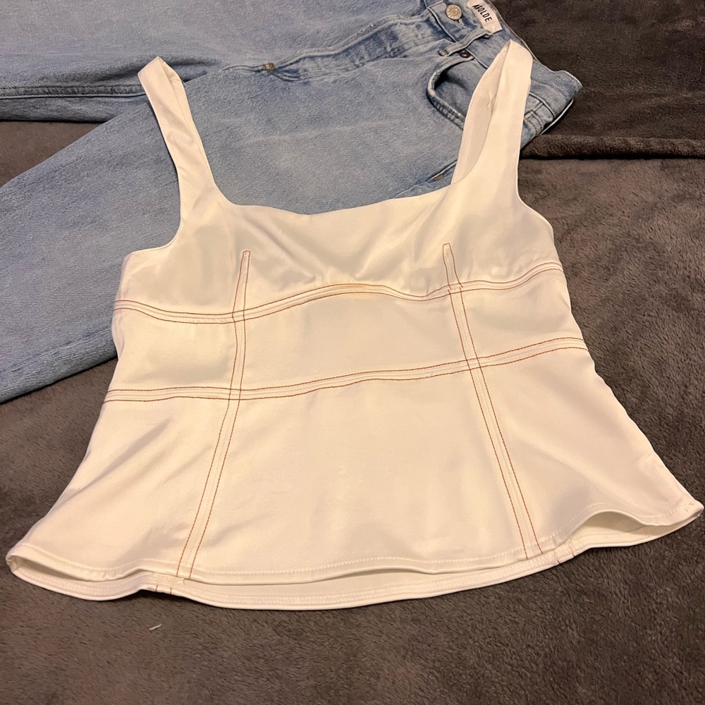 Corset StyleTop with a fitted look. Brand new with Perfect Detail. No Tag